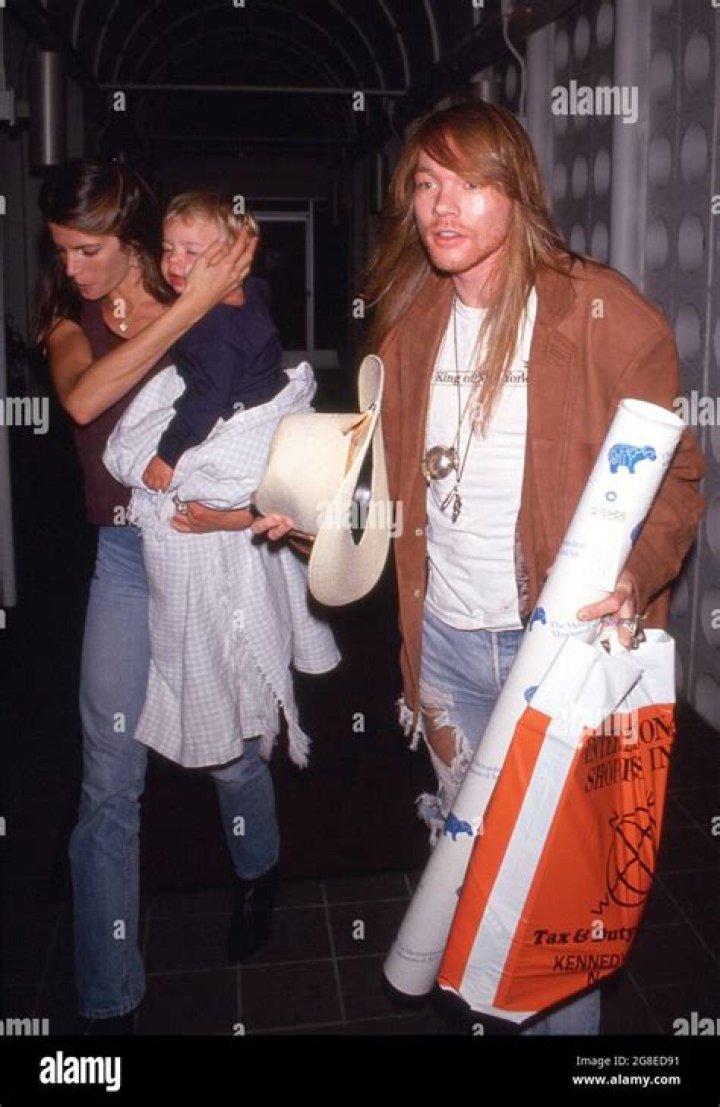 Axl Rose with Stephanie Seymour and her baby son Dylan, early 90's