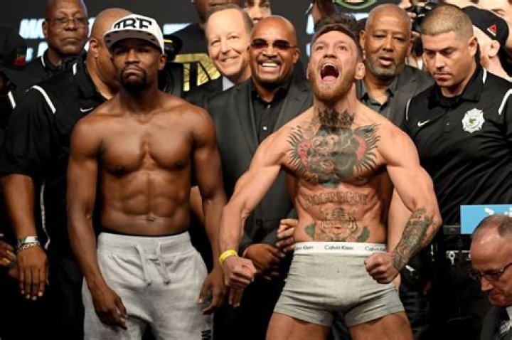 Floyd Mayweather, Conor McGregor easily make weight for big fight The