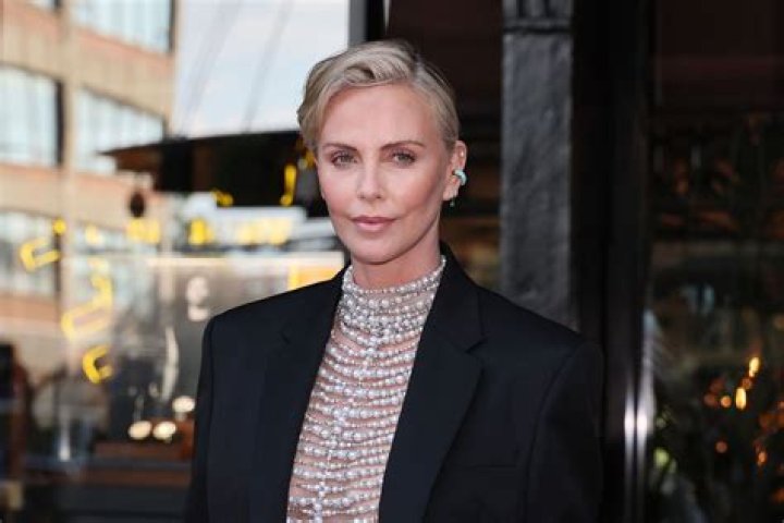 Hollywood Stars Charlize Theron With Her Husband Townsend In Pictures 2012