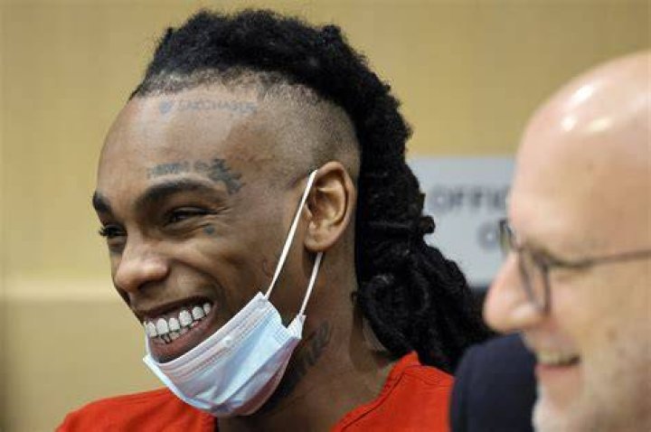 Is YNW Melly still in prison and what crimes is he accused of
