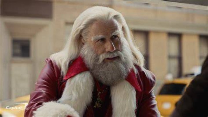 John Travolta's Festive Transformation: Unwrapping The Santa Commercial