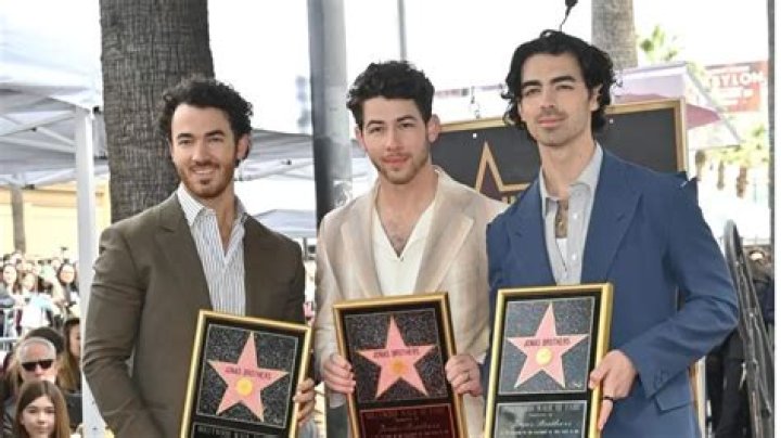 Jonas Brothers Check Out Star Wars Galaxy&rsquo;s Edge at Walt Disney World
