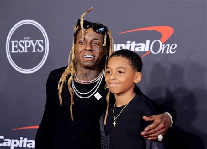 Lil Wayne & His Son Sit Courtside At The NBA Finals
