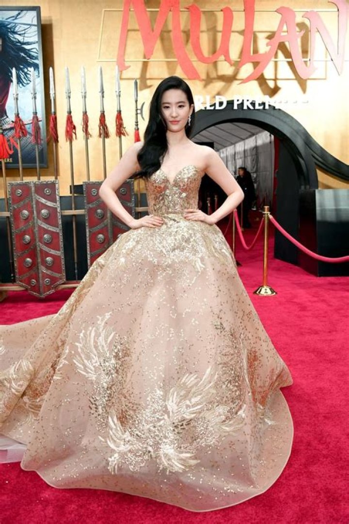 Liu Yifei Wearing Gold Elie Saab Gown at Mulan Premiere POPSUGAR Fashion