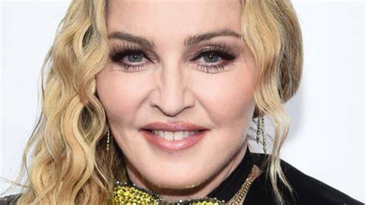 Madonna Opens Up About Adoption Journey