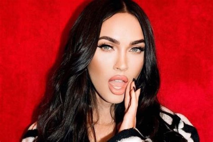 Megan Fox wears orange bikini as she announces she loves toxic