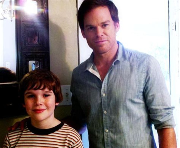 Michael C. Hall & Wife Enjoy Fresh Air With Their Pup Photo