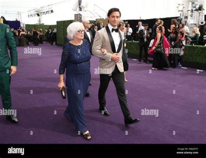Milo Ventimiglia, right, and Carol Ventimiglia arrive at the 71st