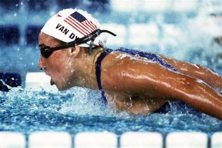 Olympic Swimmer Amy Van Dyken Walking with Use of Special Equipment
