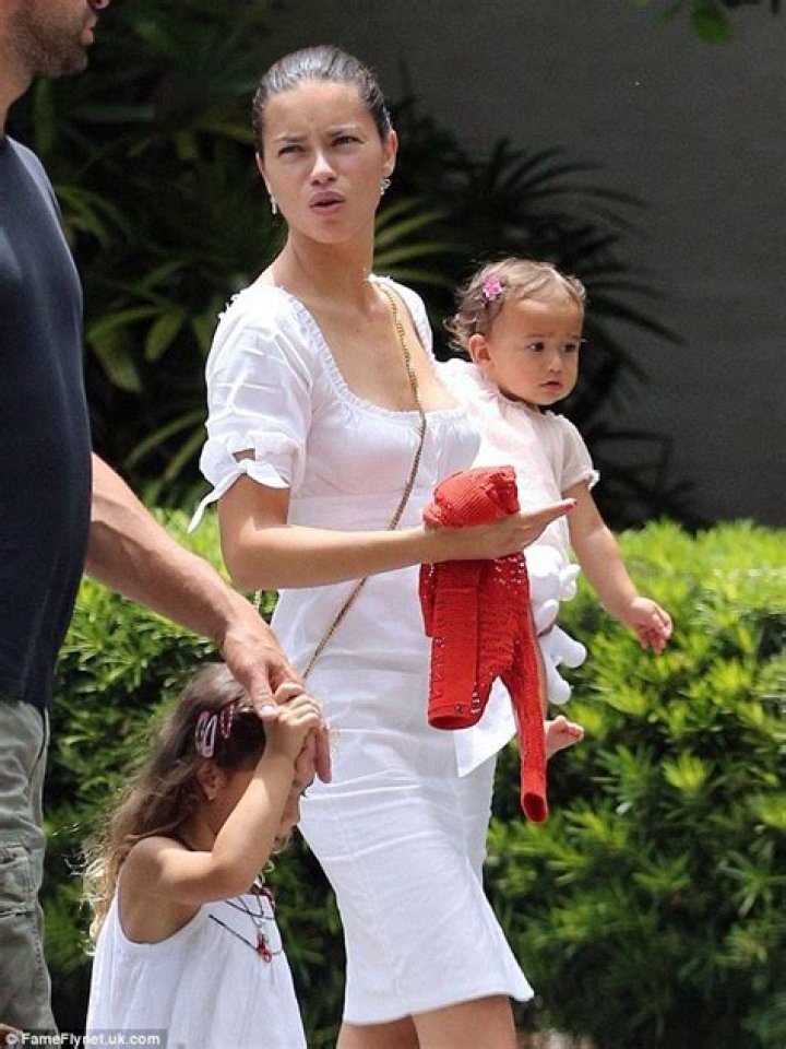 One very photogenic family! Supermodel Adriana Lima and husband take