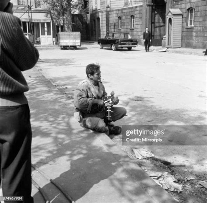 Rod Taylor, on a Sherman tank, on the set of MGM's new film 'The
