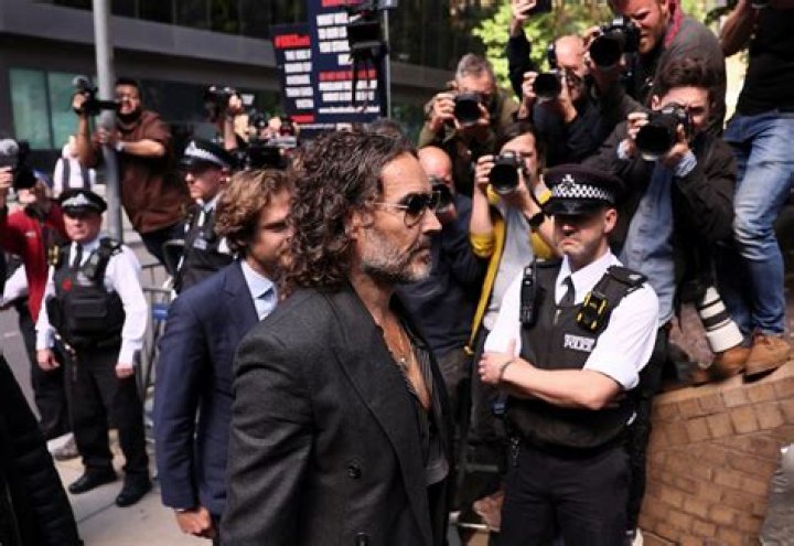 Russell Brand denies rape and sexual abuse allegations, Dolly Parton
