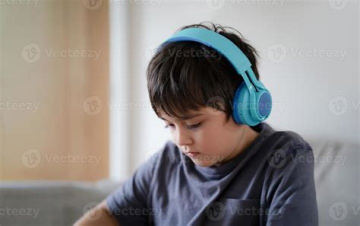 Shocked kid wearing headphones on Craiyon