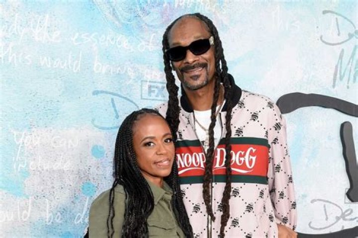Snoop Dogg and wife Shanta Taylor, married 1998 Snoop dogg son