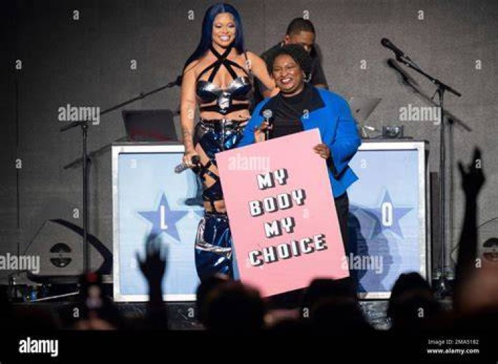 Stacey Abrams Joins Latto on Stage With 'My Body, My Choice' Sign in