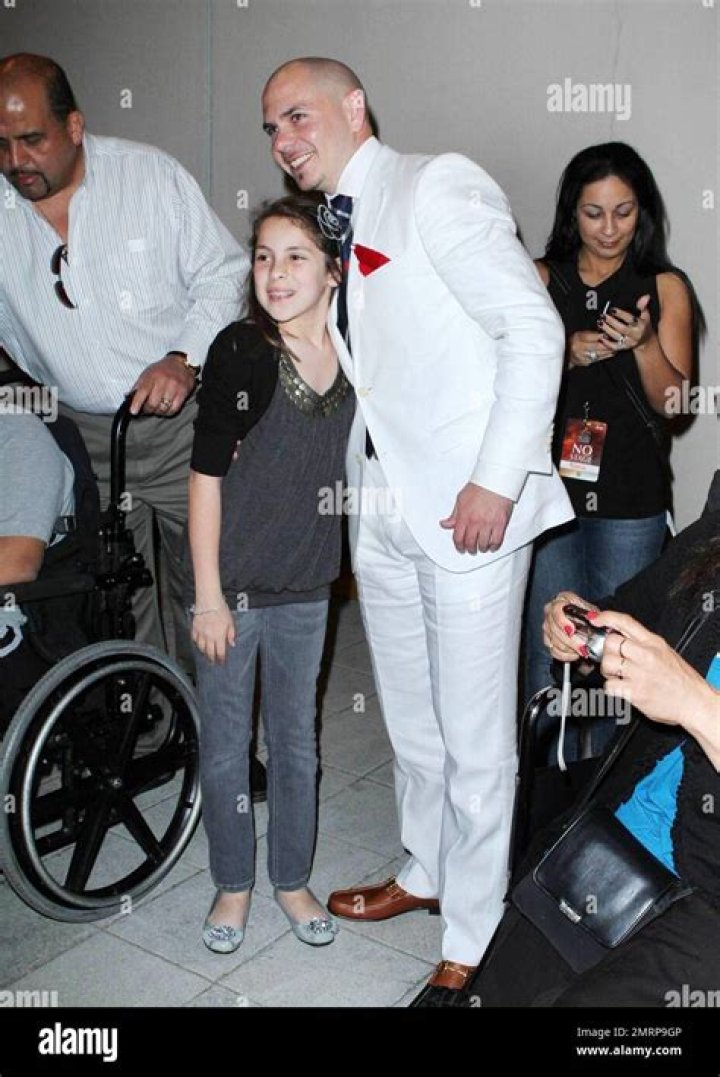 The Unveiling: Singer Pitbull's Wife Revealed