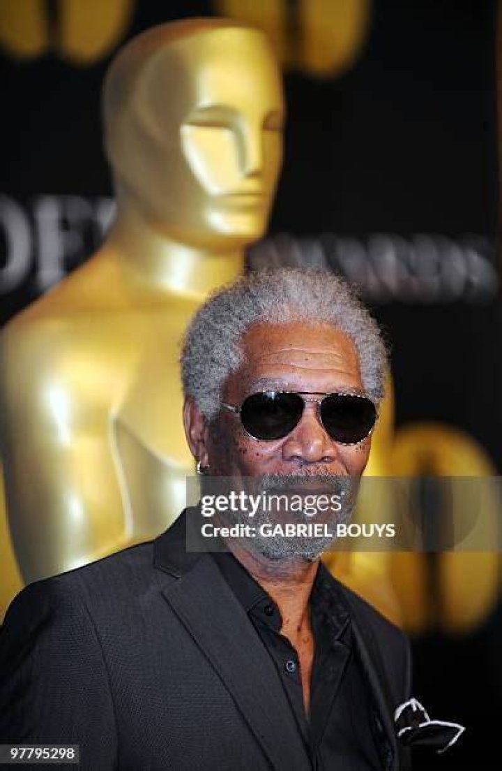 US actor Freeman (R) arrives with his wife Myrna ColleyLee to