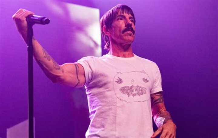 Watch Anthony Kiedis run from the law in Red Hot Chili Peppers' 'These