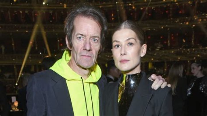 Who is Rosamund Pike's partner and do they have children?